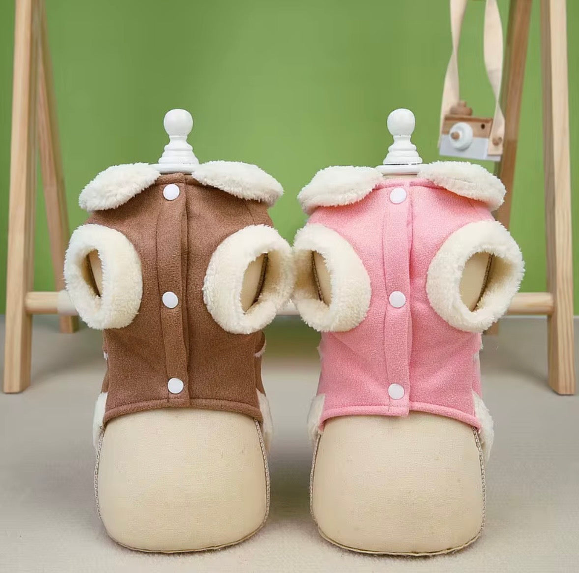Jecikelon brand beige suede winter coat for small dogs featuring a white fleece lining, turtleneck collar, and decorative bow tie.
