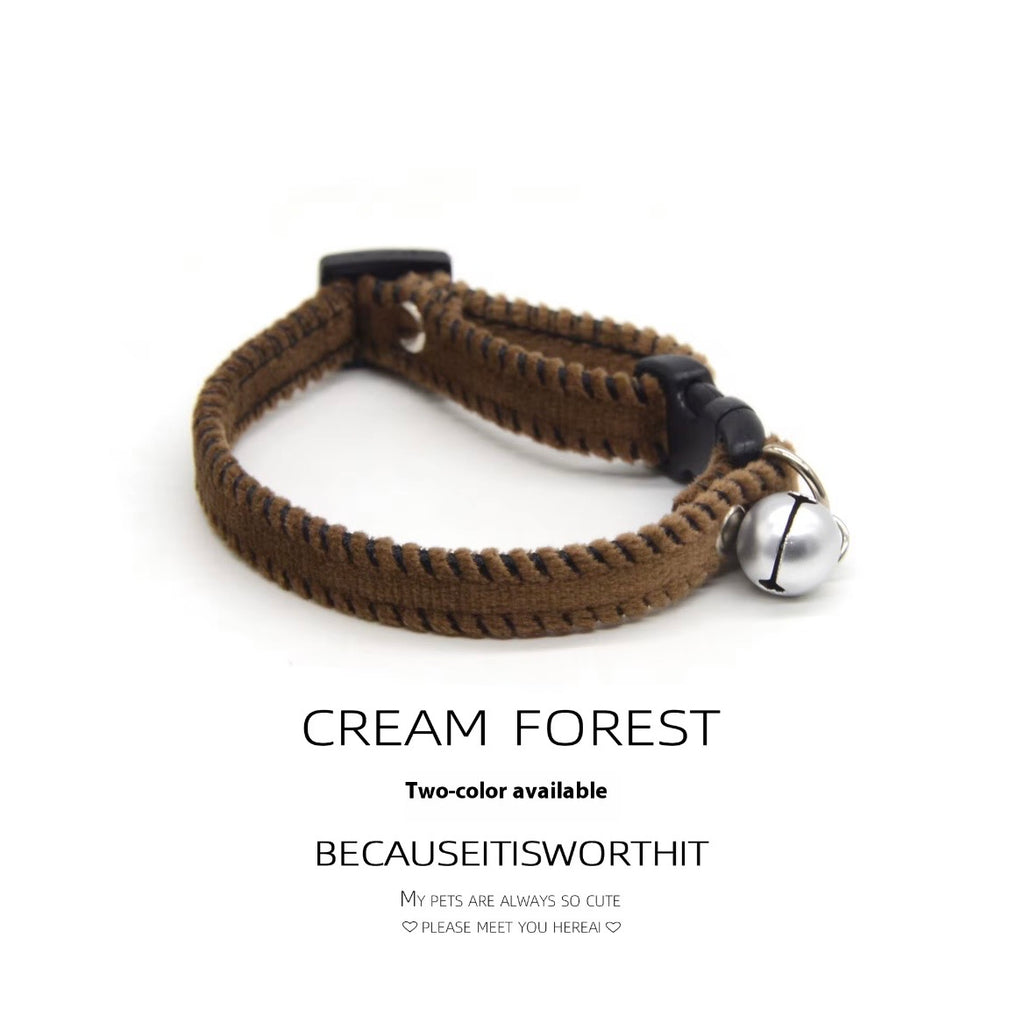 KASTWAVE brown and white velvet breakaway cat collar featuring two jingle bells