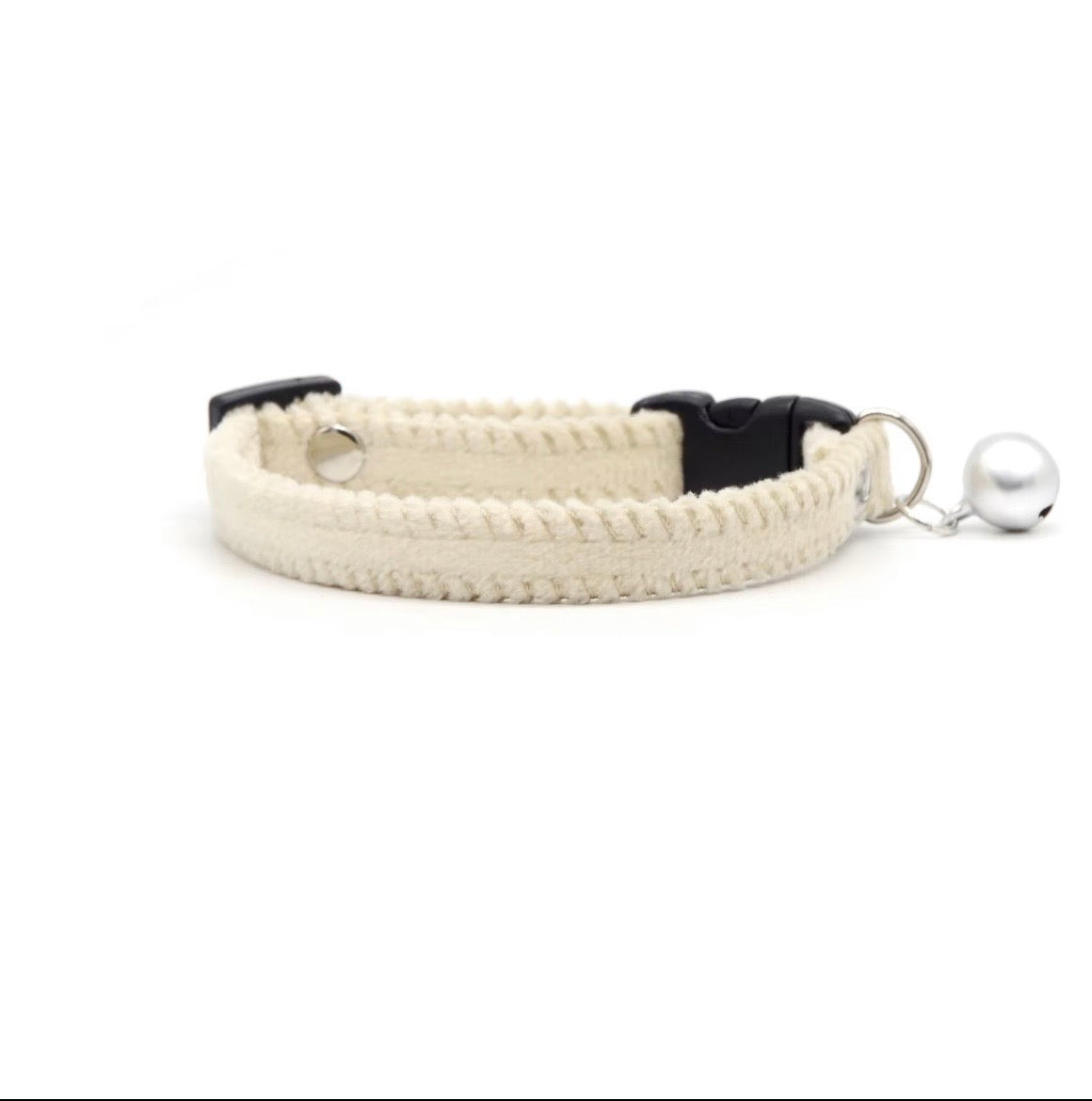 KASTWAVE brown and white velvet breakaway cat collar featuring two jingle bells