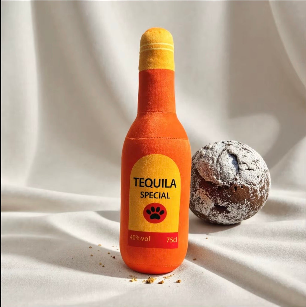 plush, squeaky bottle-shaped toys designed for dogs and cats, featuring various liquor and wine brand parodies.