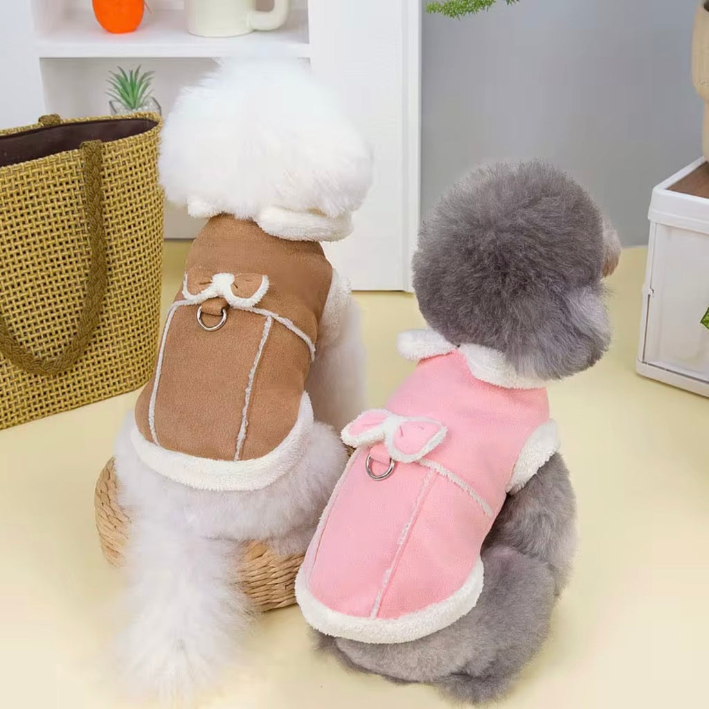 Jecikelon brand beige suede winter coat for small dogs featuring a white fleece lining, turtleneck collar, and decorative bow tie.
