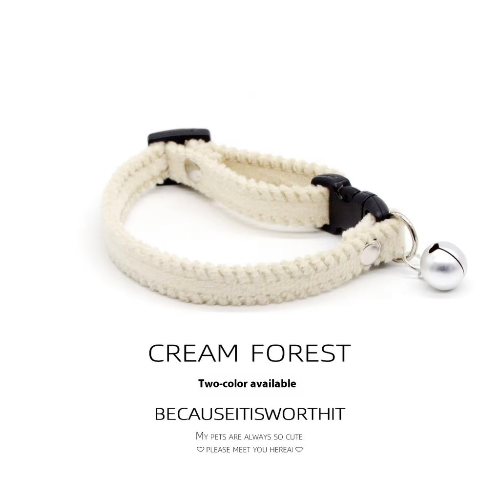 KASTWAVE brown and white velvet breakaway cat collar featuring two jingle bells
