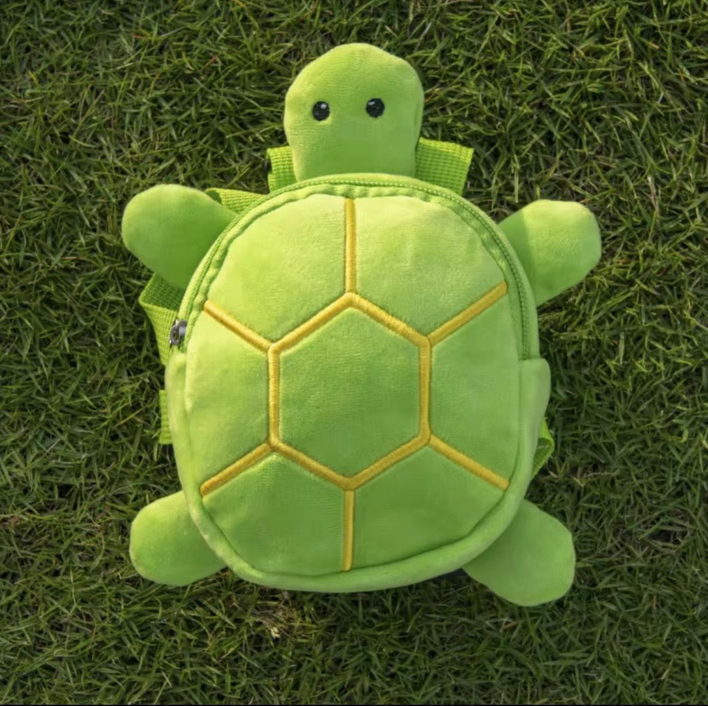 pet dog backpack harness featuring a cute, plush turtle design with a zipper closure and adjustable straps.