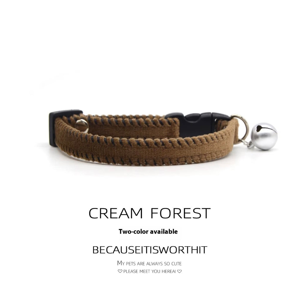 KASTWAVE brown and white velvet breakaway cat collar featuring two jingle bells