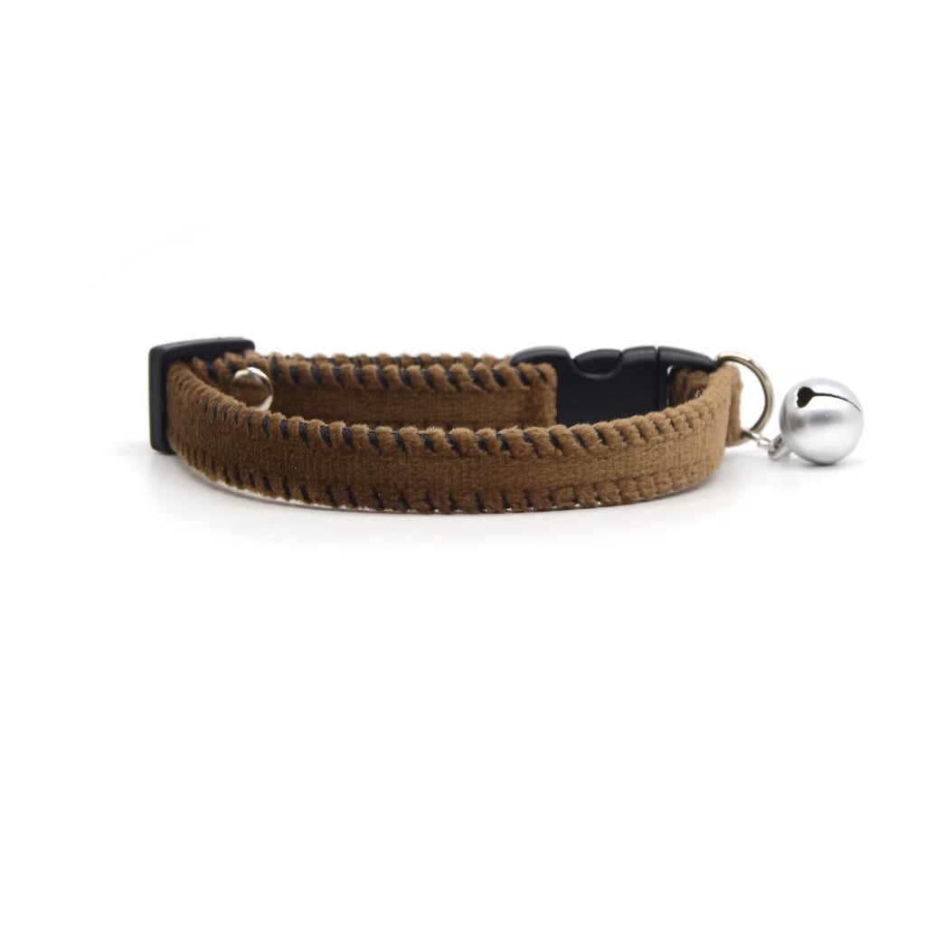 KASTWAVE brown and white velvet breakaway cat collar featuring two jingle bells