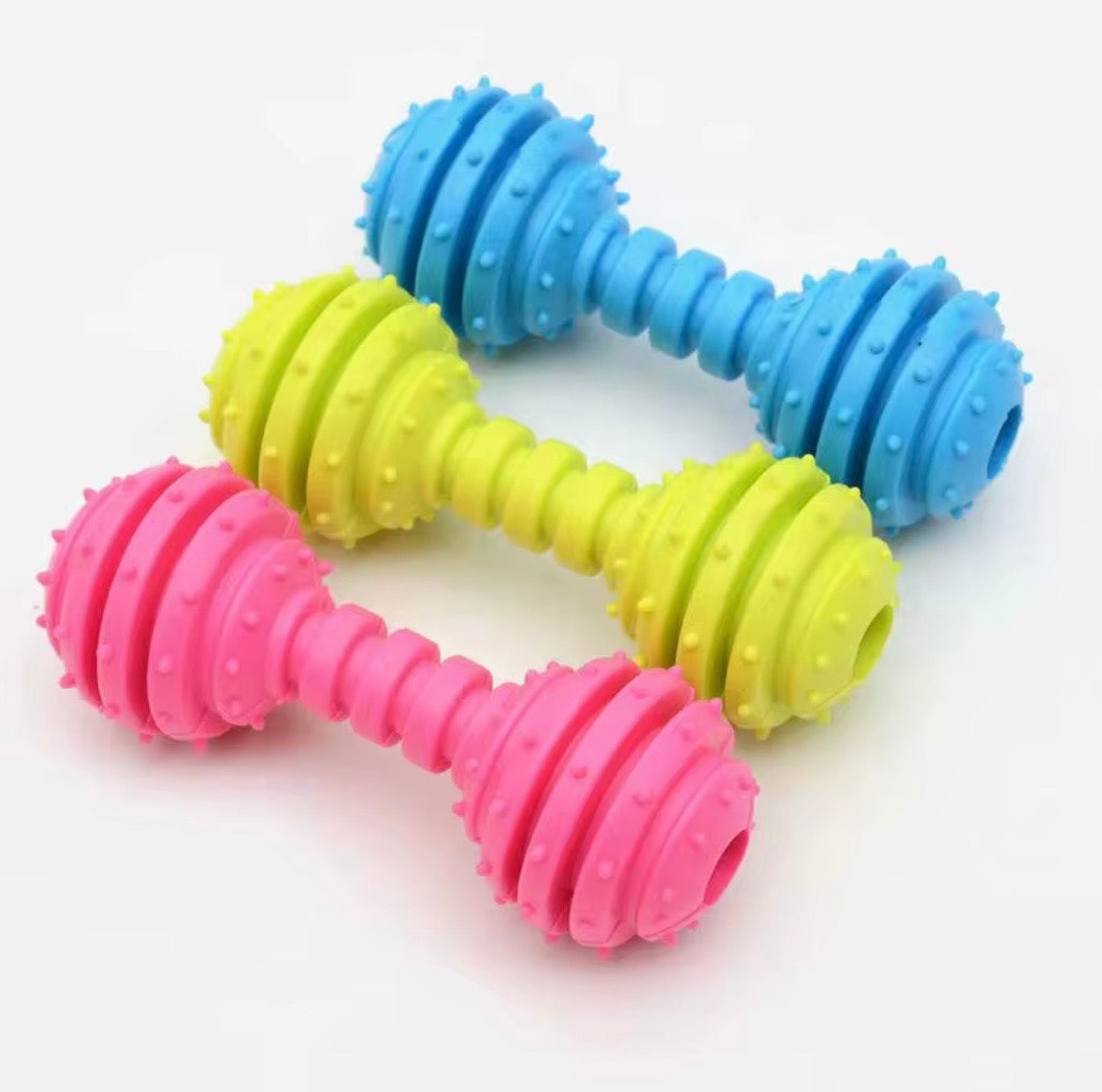 blue, studded rubber dog chew toys designed in a dumbbell shape for puppy teething.