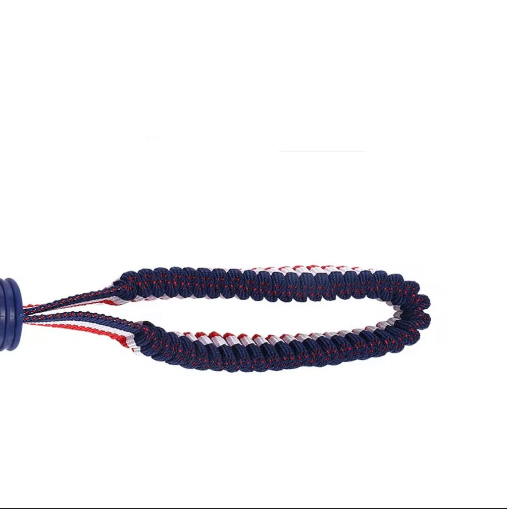 blue interactive dog toy featuring a textured ball on a red, white, and blue rope