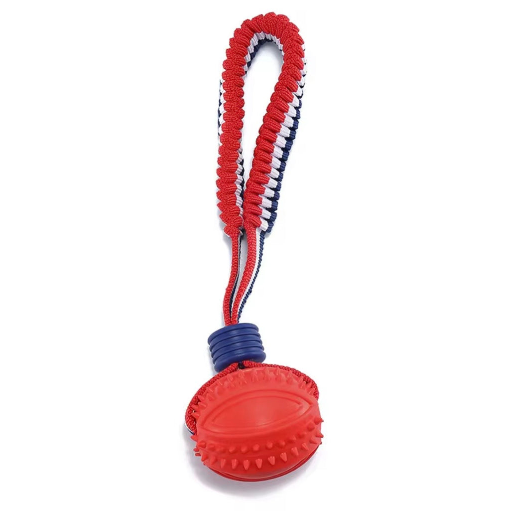 blue interactive dog toy featuring a textured ball on a red, white, and blue rope
