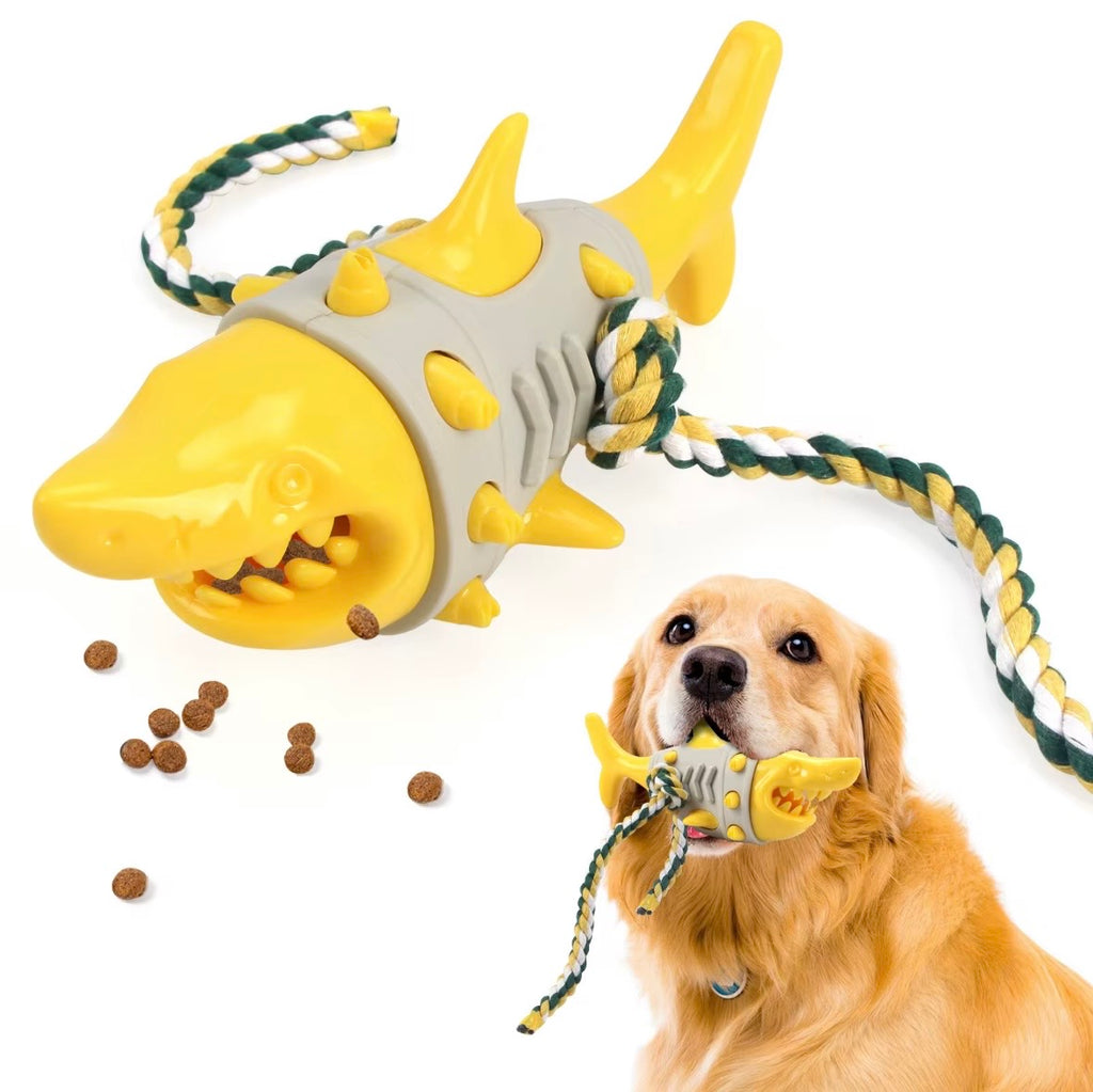 shark-shaped dog toy is designed to dispense treats and promote dental hygiene through chewing