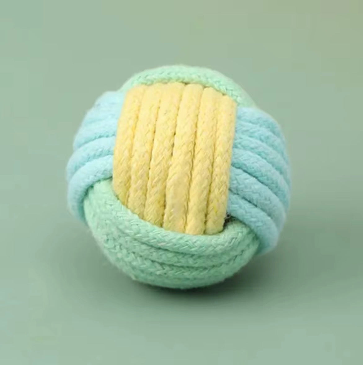 These are cotton rope cat toy balls featuring a macaron-inspired color palette.