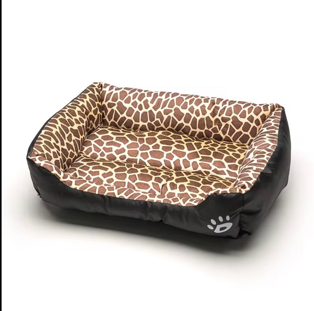 a tiger print pet sofa with a raised edge for comfort
