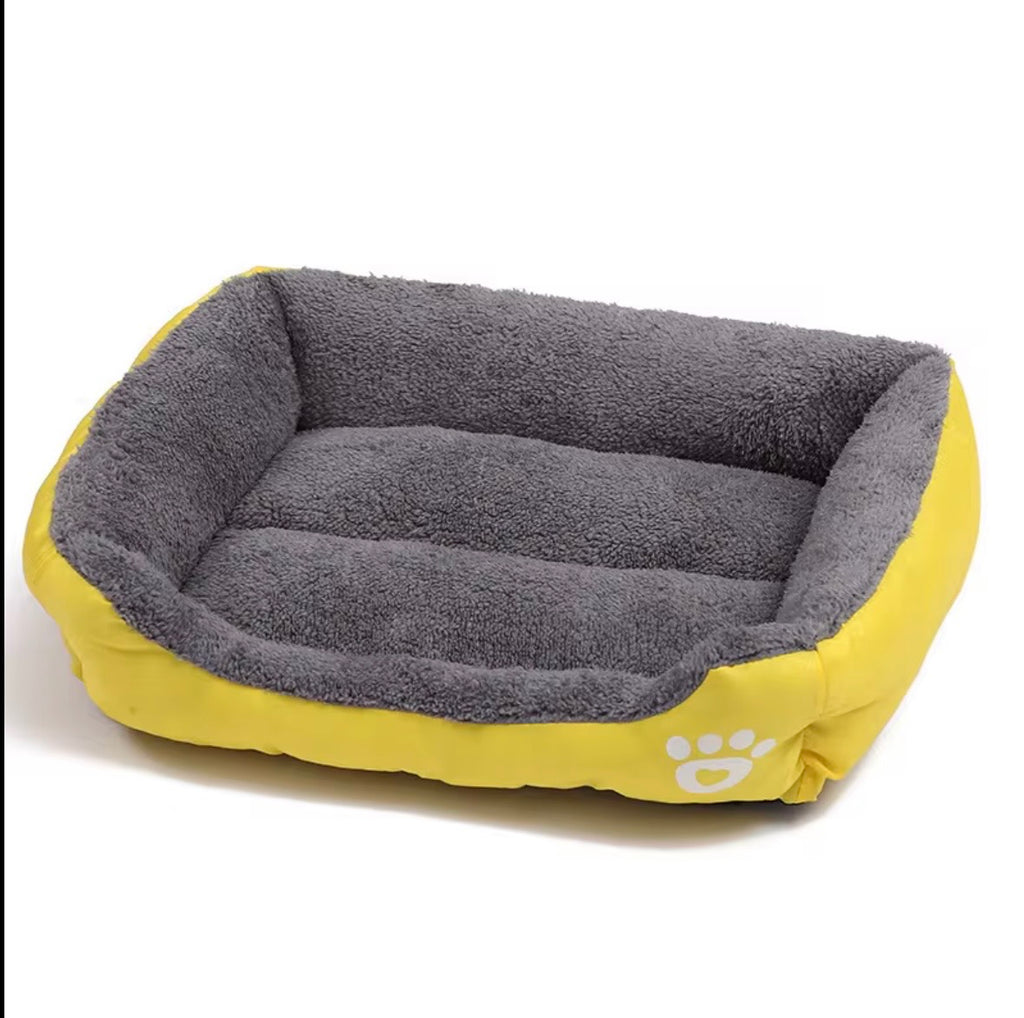 a tiger print pet sofa with a raised edge for comfort