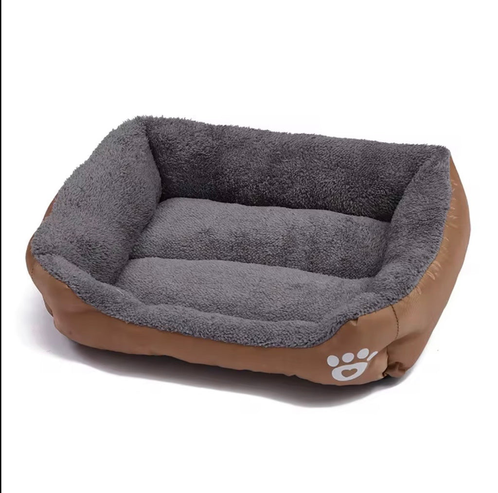 a tiger print pet sofa with a raised edge for comfort