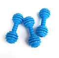 blue, studded rubber dog chew toys designed in a dumbbell shape for puppy teething.
